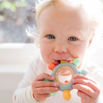 Captains Teether - Bannor Toys - little girl chewing on a teether