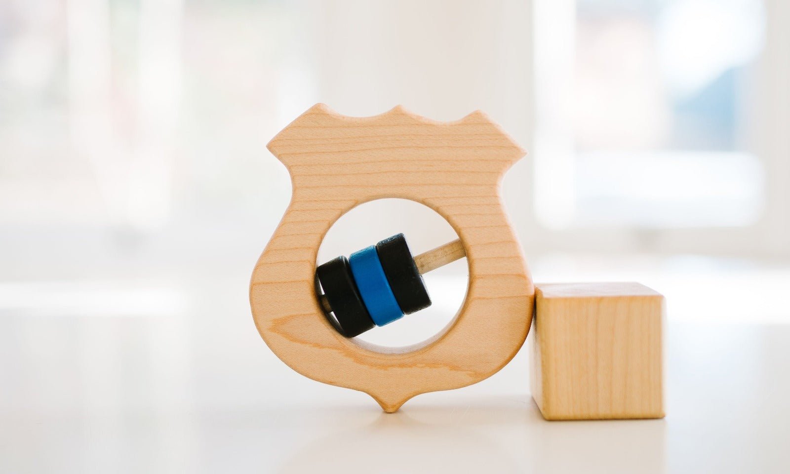 Police Shield Baby Rattle by Bannor Toys - Main Image