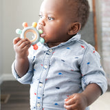 Captains Teether - Bannor Toys - toddler boy carrying a teether with him