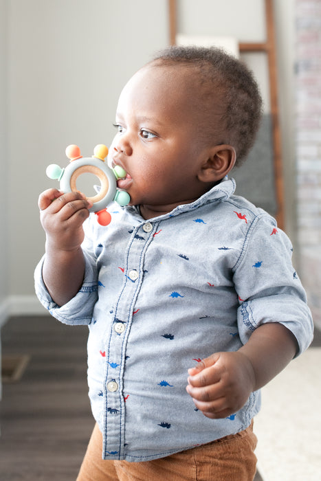 Captains Teether - Bannor Toys - toddler boy carrying a teether with him