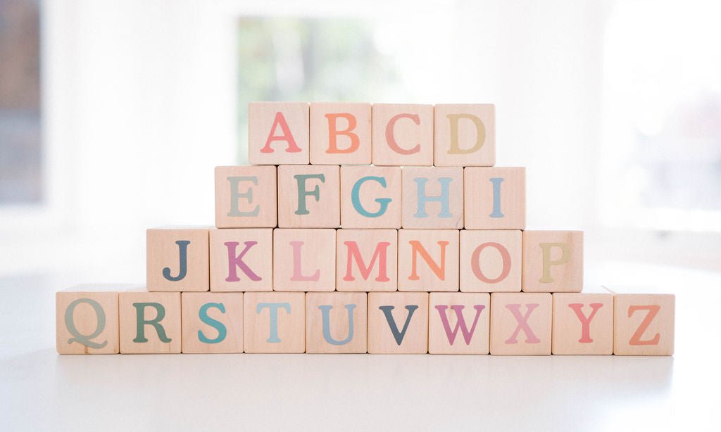 Pink wooden sales alphabet blocks